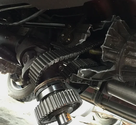 Close-up of drivetrain and transfer case repair work